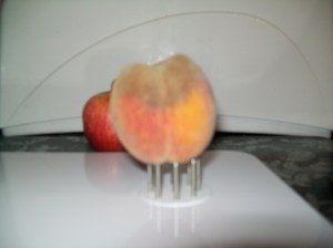peach on chopping board